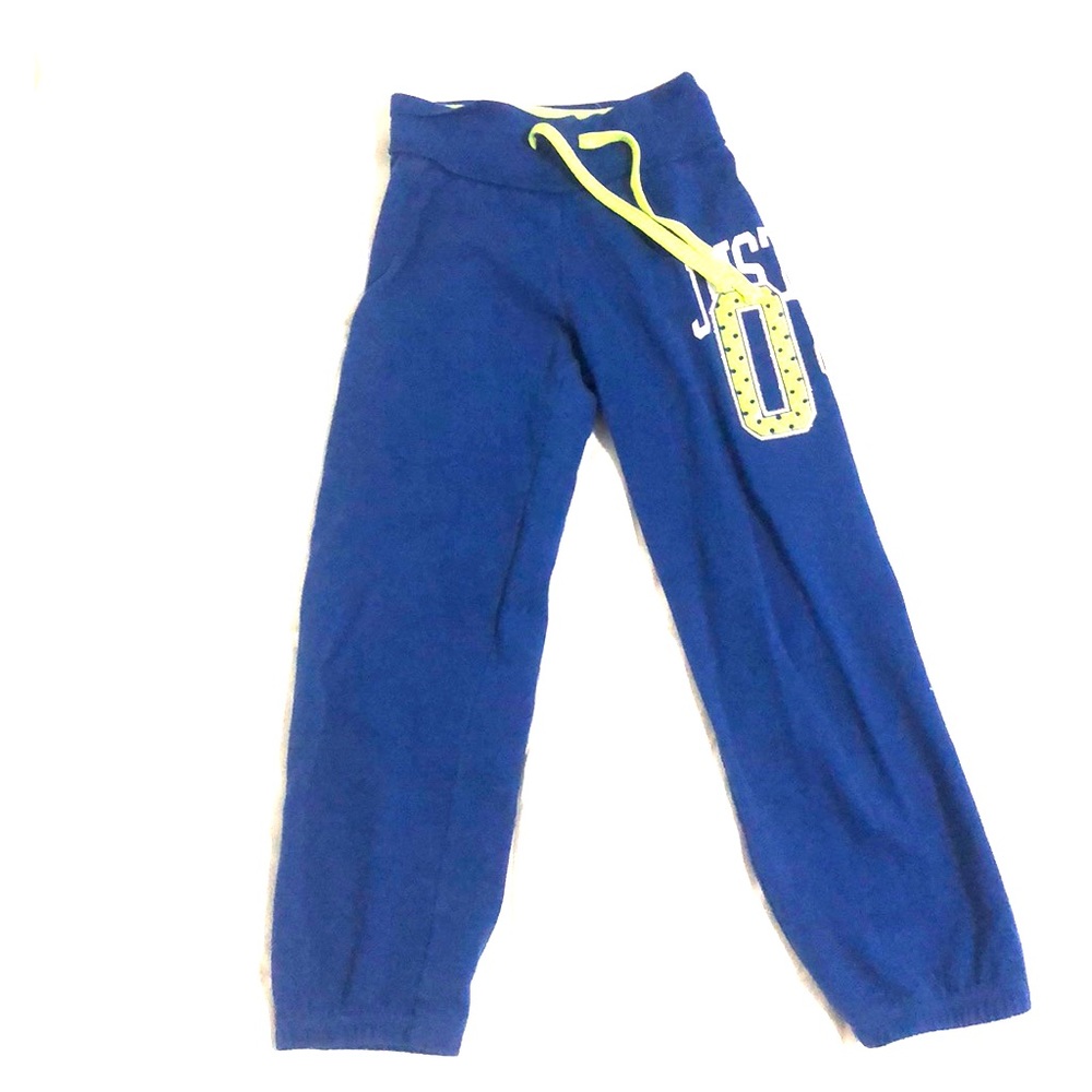 Blue joggers with neon green waste tie.